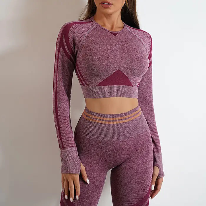 Women’s seamless activewear with long-sleeve crop top and high-waisted leggings in purple