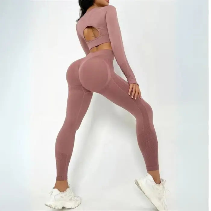 Women's seamless butt-lifting sportswear sets in mauve pink tone with textured shaping accents.