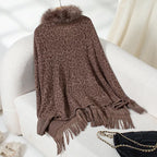 womens shawl displayed in brown leopard knit with fringe edges, offering versatile styling and winter warmth