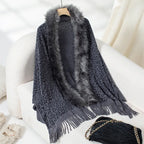 womens shawl in dark gray with faux fur trim and fringe hem, ideal for layering during cold seasons