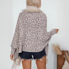 womens shawl shown from the back with leopard print knit fabric, offering relaxed drape and cozy seasonal warmth
