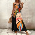  Women's tropical leaf print maxi dress styled with boho jewelry, beach bag, and flat sandals.
