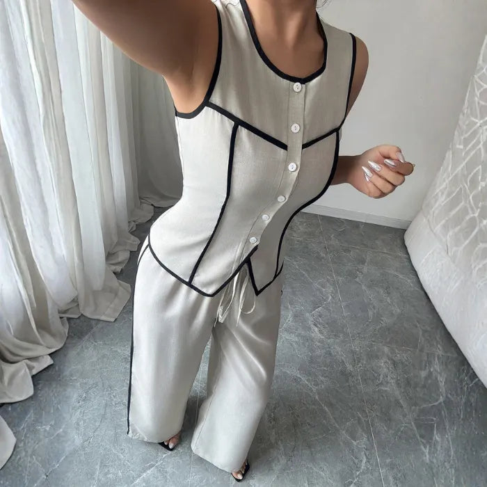 womens vest pant set close up highlighting structured vest buttons contrast piping and flattering tailored design