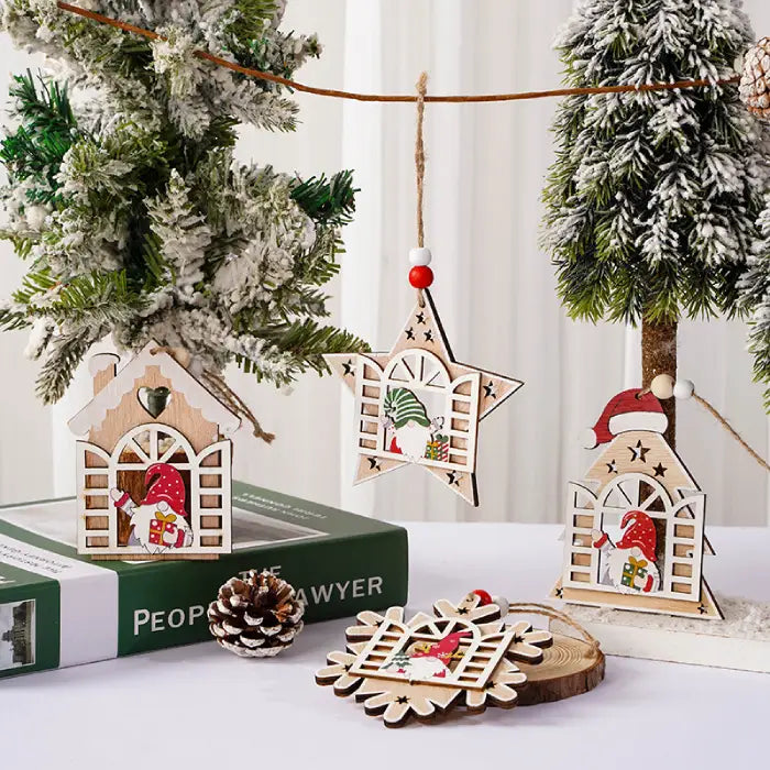 Set of Wooden Christmas Ornaments featuring gnomes and festive shapes hanging on a Christmas tree