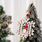 Snowflake-shaped Wooden Christmas Ornament with a red gnome and reindeer antlers on pine tree