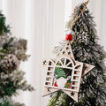 Star-shaped Wooden Christmas Ornament featuring a green-hatted gnome and gift box