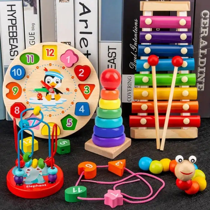 Wooden Stem toys featuring xylophone, stacking rings, clock, lacing beads, and bead maze for toddlers.