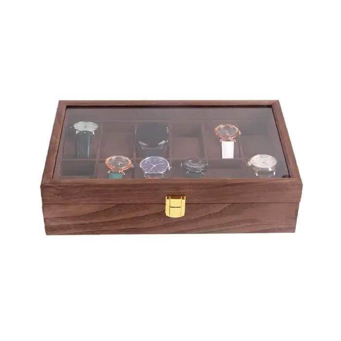 Wooden watch box with a glass display lid showcasing various watches