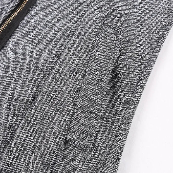 wool blend hooded coat pocket close-up showing textured fabric and clean stitching, highlighting premium winter outerwear quality