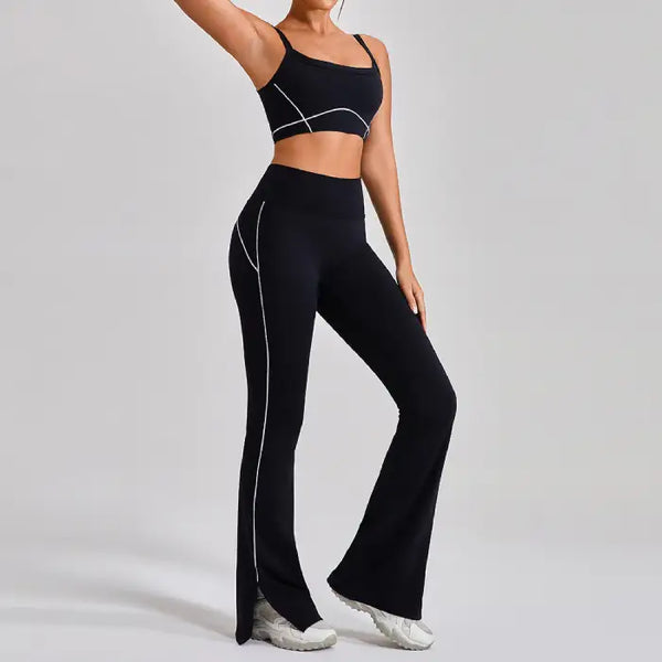 Workout clothes women featuring black sports bra with high-waisted flared pants and white contour piping for stylish fitness wear