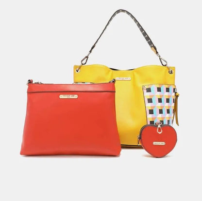 Yellow leather tote with coral clutch bag and heart-shaped coin purse, featuring geometric pattern accent panels