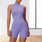 yoga bodysuit in soft lavender with front zipper closure and mock neck design for studio practice