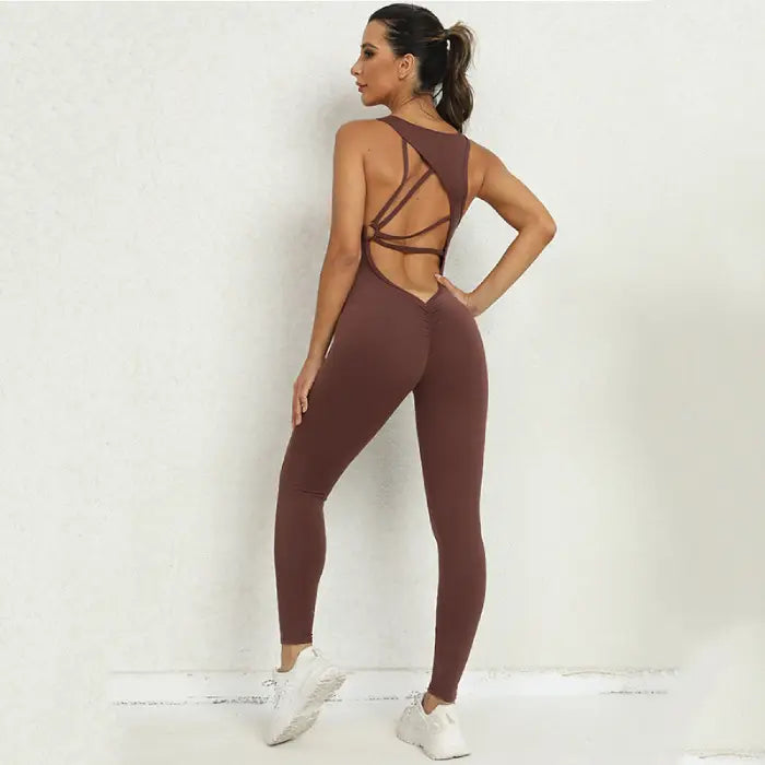  Yoga-jumpsuit with strappy open back in brown, ideal for activewear or athleisure fashion looks.