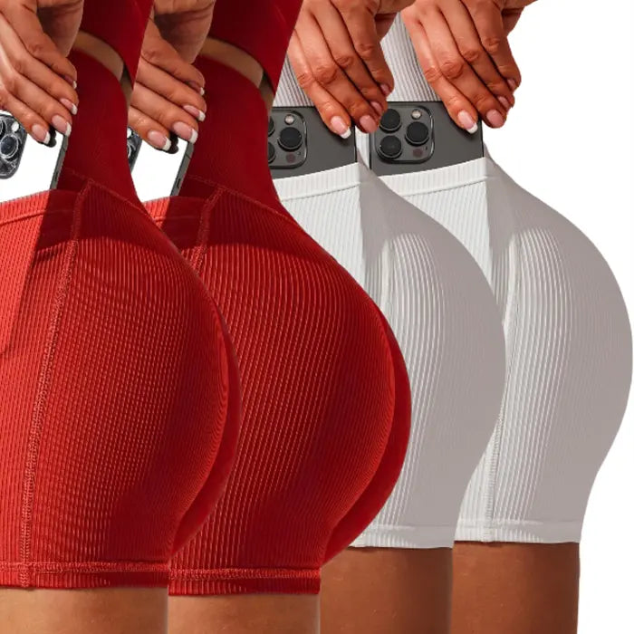 Yoga shorts set four-pack in red and white colors with phone pockets and textured finish.