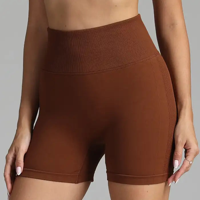 Yoga shorts women in brown color with sculpting fit and wide ribbed waistband.