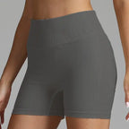 Yoga shorts women in dark grey with sleek look and supportive waistband design.