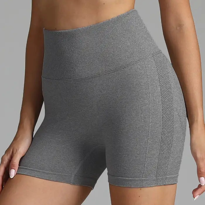 Yoga shorts women in heather grey with ribbed high waist and flexible activewear fabric.