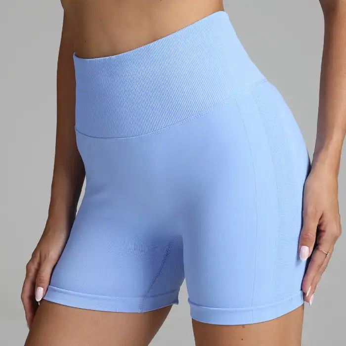 Yoga shorts women in light blue with high waist and sculpting seamless fabric.