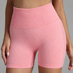 Yoga shorts women pink seamless design with high-waist compression for comfortable workout support.