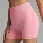 Yoga shorts women in light pink heather tone with contour knit detailing and comfort stretch.