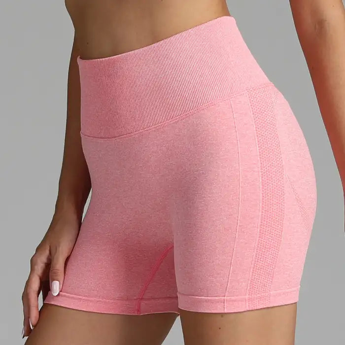Yoga shorts women in light pink heather tone with contour knit detailing and comfort stretch.