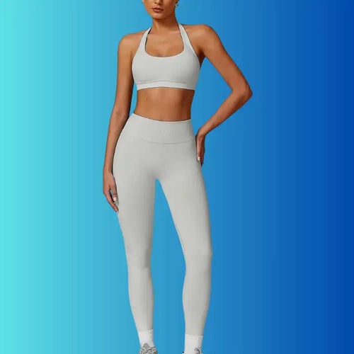 Yoga Workout Set in light grey shown from front with halter sports bra and seamless high-waisted leggings.