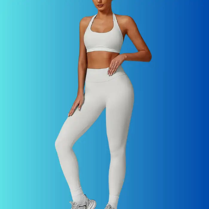 Yoga Workout Set in light grey shown from side angle with halter bra and sculpted leggings.