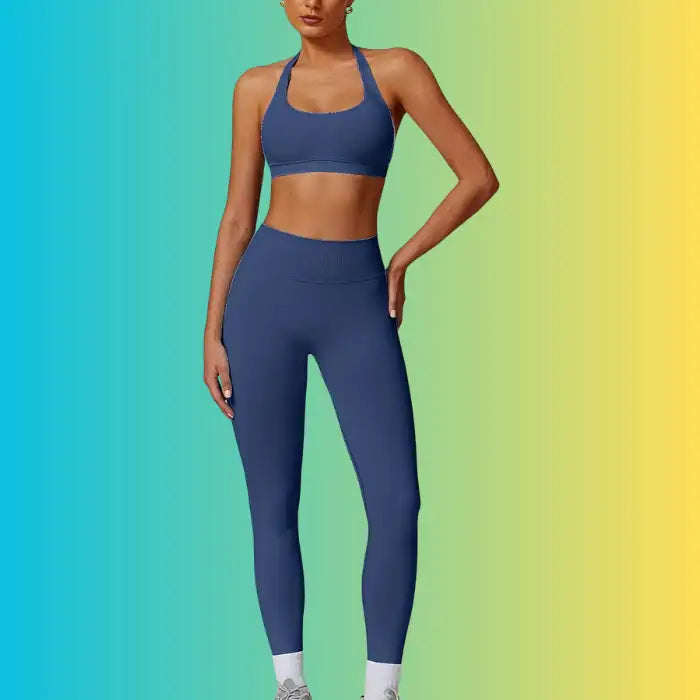 Yoga Workout Set in navy blue shown from front with halter neck sports bra and snug-fit leggings.