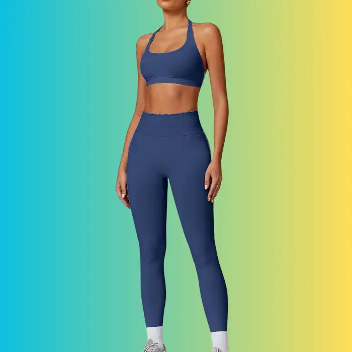 Yoga Workout Set in navy blue shown from side angle with compressive leggings and matching sports bra.