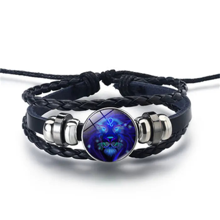 Zodiac Sign Bracelet with a vivid Leo lion design glowing in blue hues, paired with braided leather for a striking celestial astrology accessory.