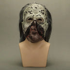 Horror-themed mask on a mannequin head against a plain background