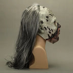 Zombie face mask side profile on mannequin, with long gray hair and decayed skin.